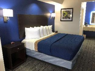Executive Inn And Suites Joaquin Стая снимка