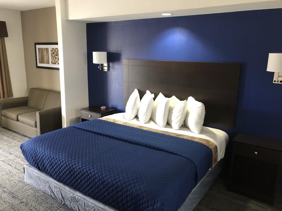 Executive Inn And Suites Joaquin Екстериор снимка
