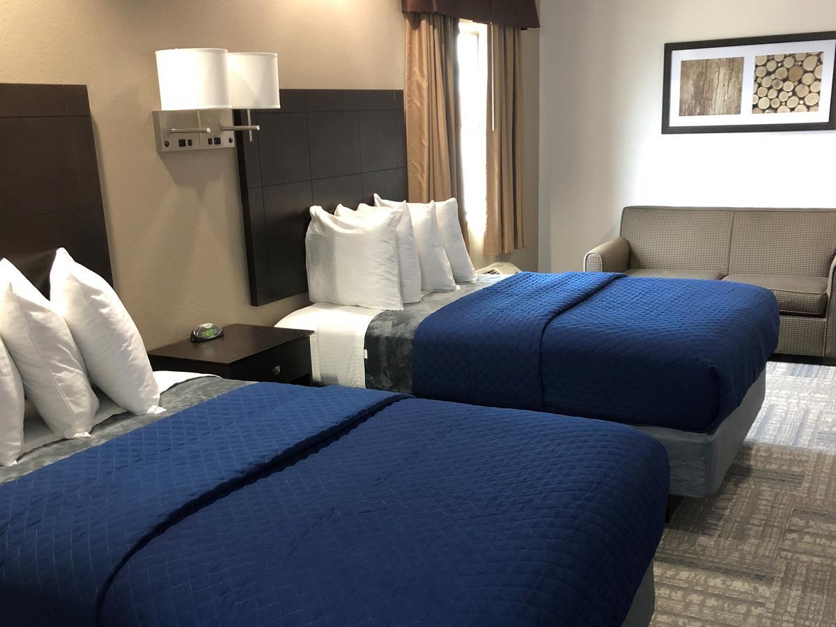 Executive Inn And Suites Joaquin Екстериор снимка
